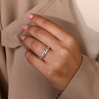 Lab grown diamond set in a prong set 7 stone diamond band.
