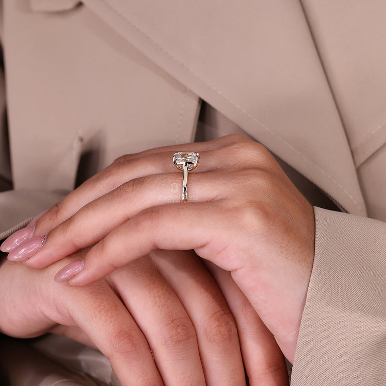 Claw prong setting for lab grown diamond.