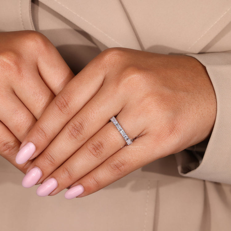 Princess and baguette diamond band for elegance.
