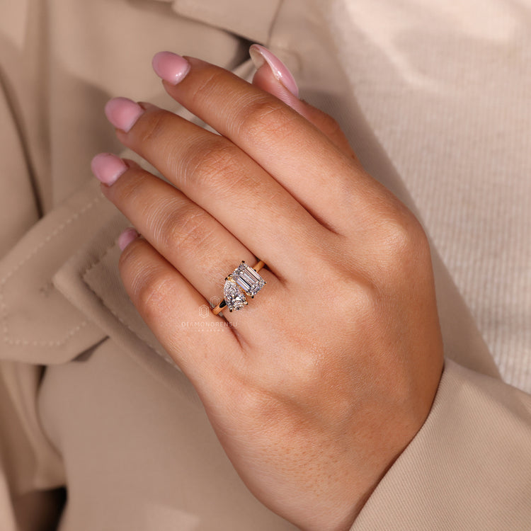 Claw prong setting on custom diamond ring in yellow gold.
