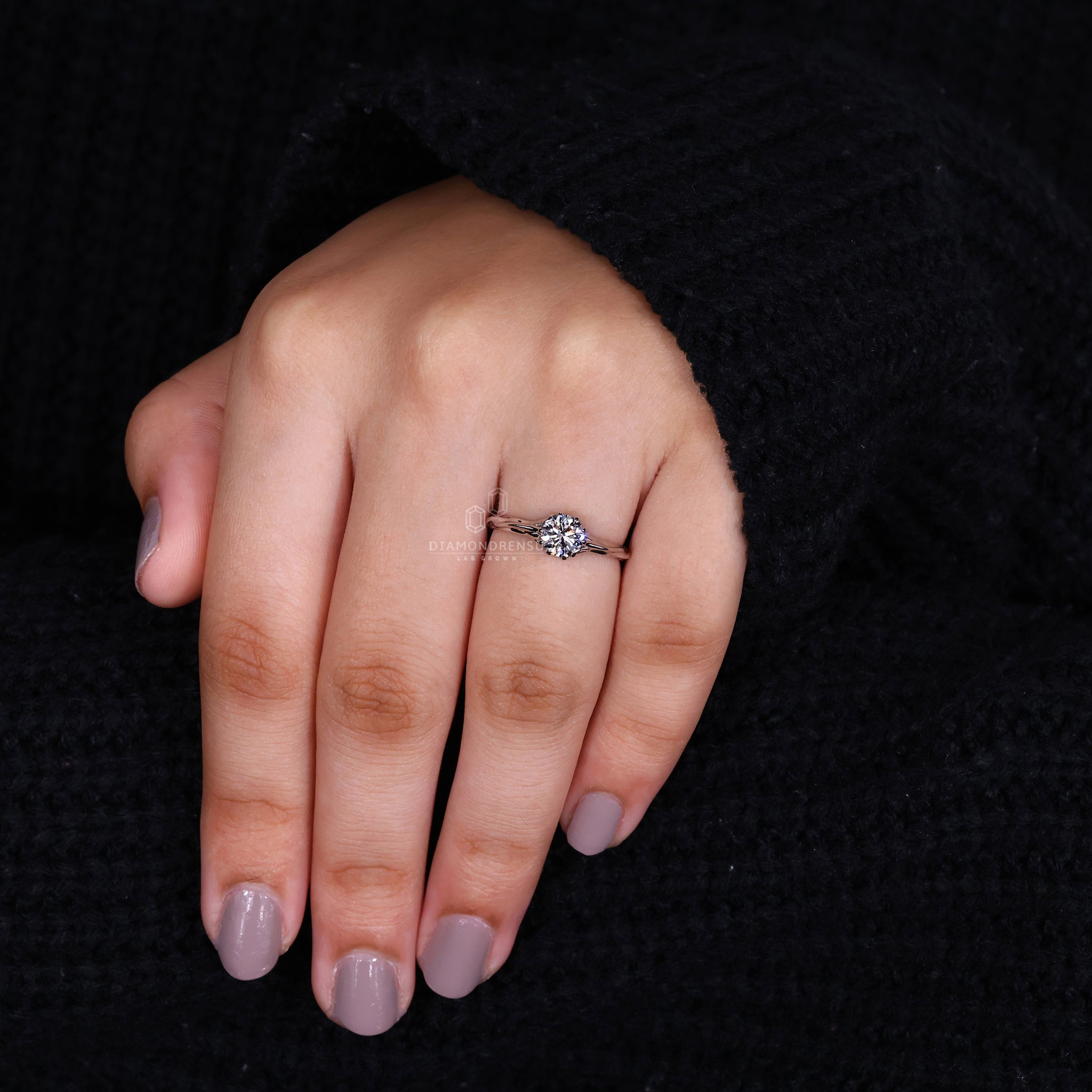 Diamondrensu ring featuring a nature inspired design and a round solitaire diamond, handcrafted for a unique look