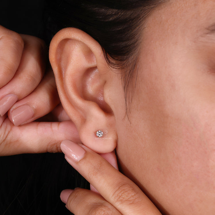 Diamond earrings studs designed to elevate your look with handmade craftsmanship.
