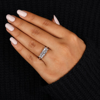 Elegant princess cut ring crafted in white gold.
