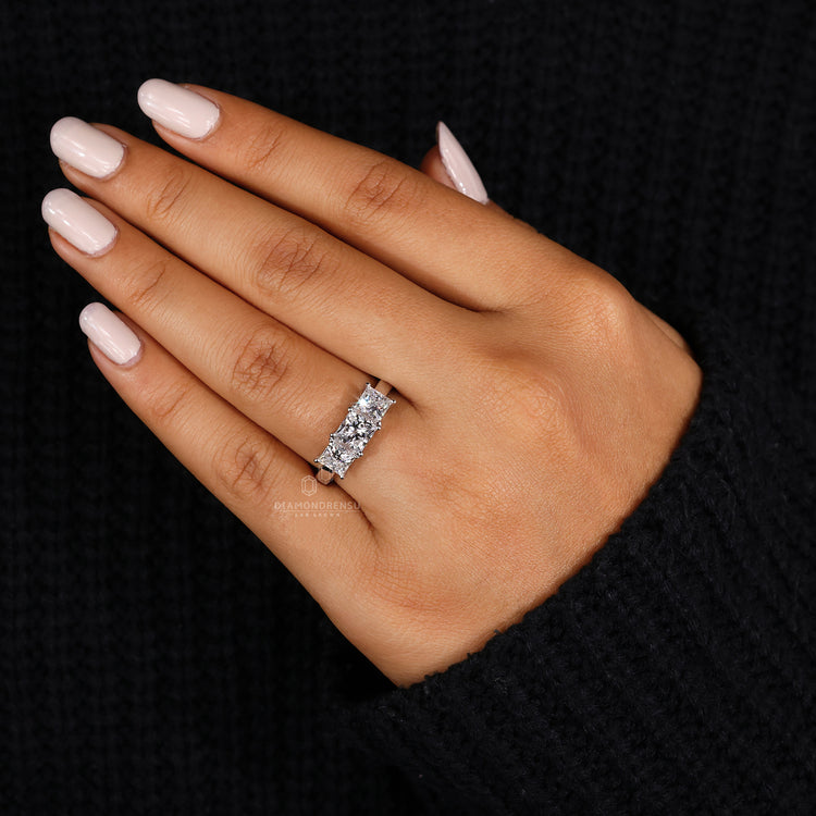 Elegant princess cut ring crafted in white gold.
