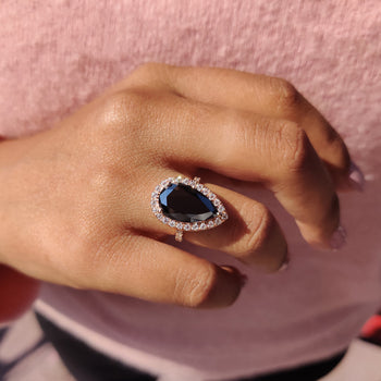 The black moissanite ring offers bold contrast and elegance.
