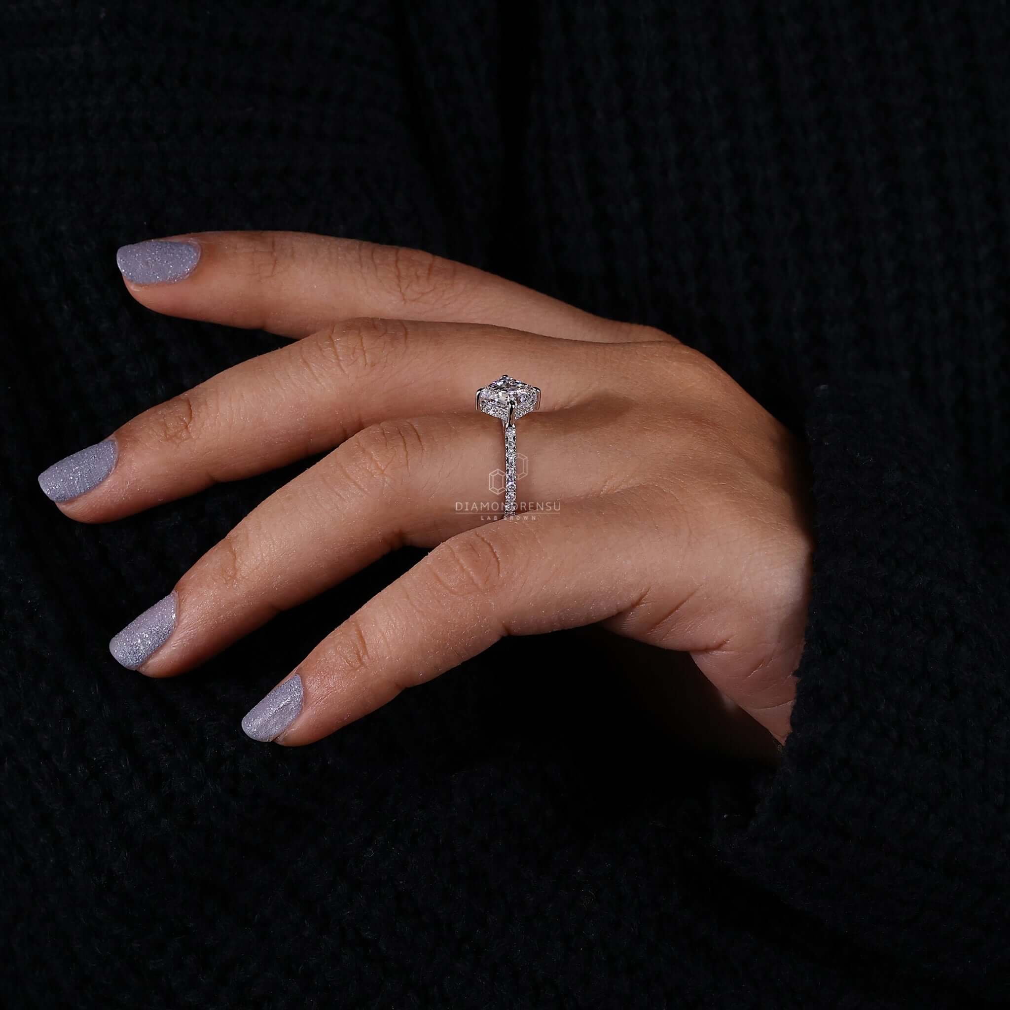 east to west diamond ring