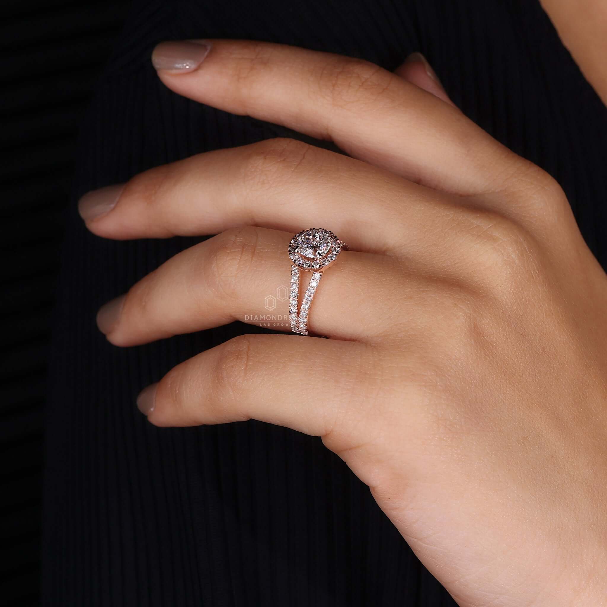 Close-up of split shank engagement ring on hand