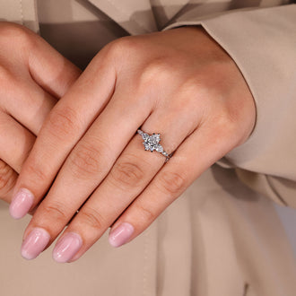 Five claw prong pear diamond ring.
