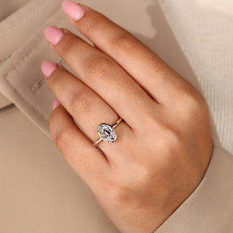 IGI certified oval old European cut diamond engagement ring in yellow gold.
