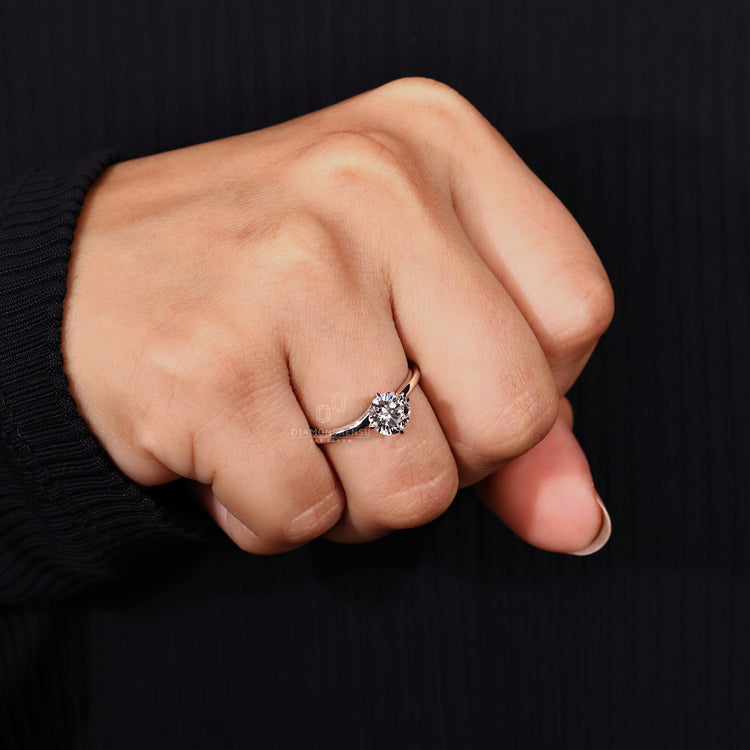 Solitaire Ring featuring a brilliant round diamond.