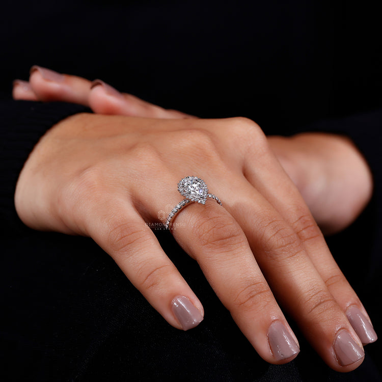 Pave Setting Ring designed to enhance the central diamond's brilliance.