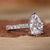 Elegant pear shaped diamond engagement ring on a model's hand