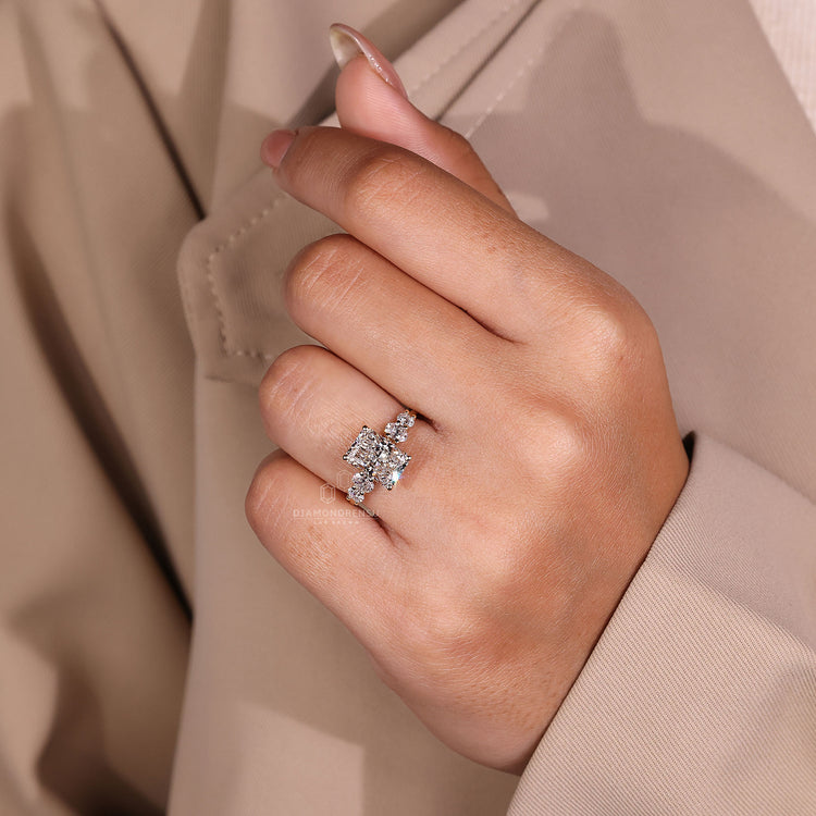 Diamond ring oval shape with radiant cut diamonds for added brilliance.
