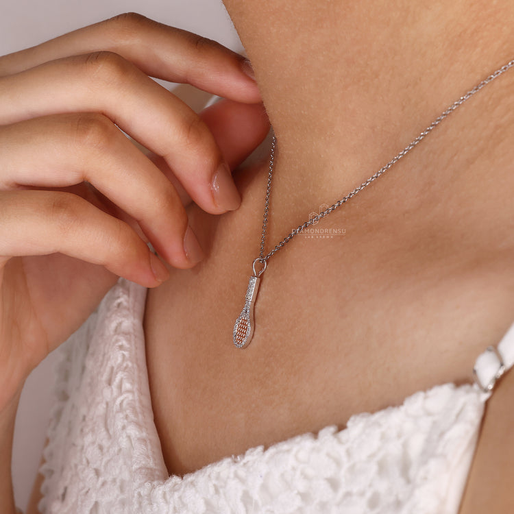 White gold racket charm shape diamond pendant for men.
