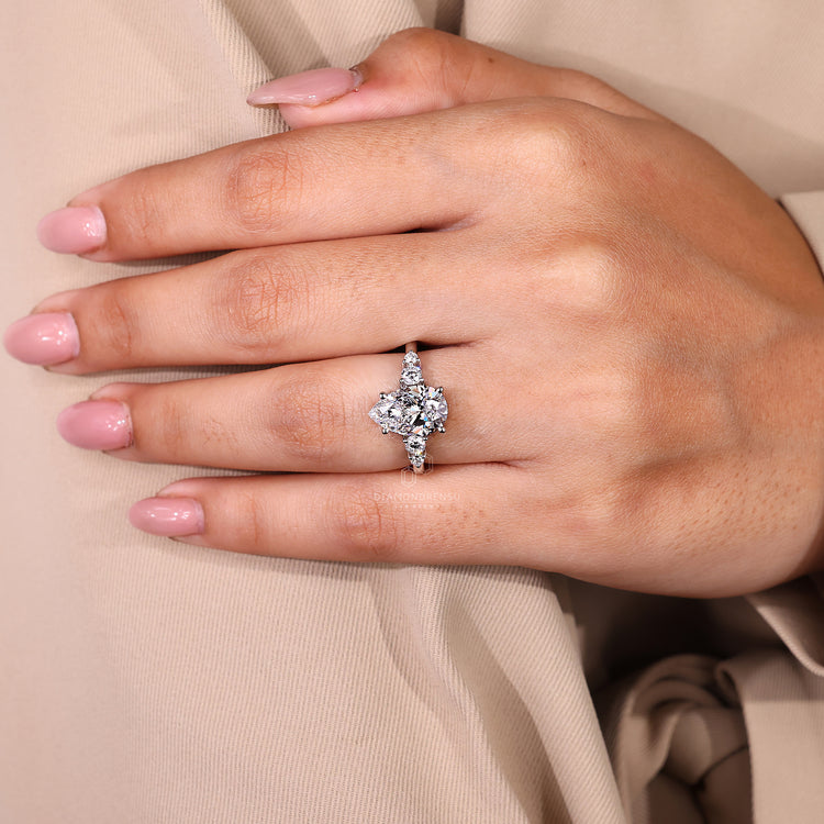 Handmade jewelry featuring a 5 stone diamond ring.
