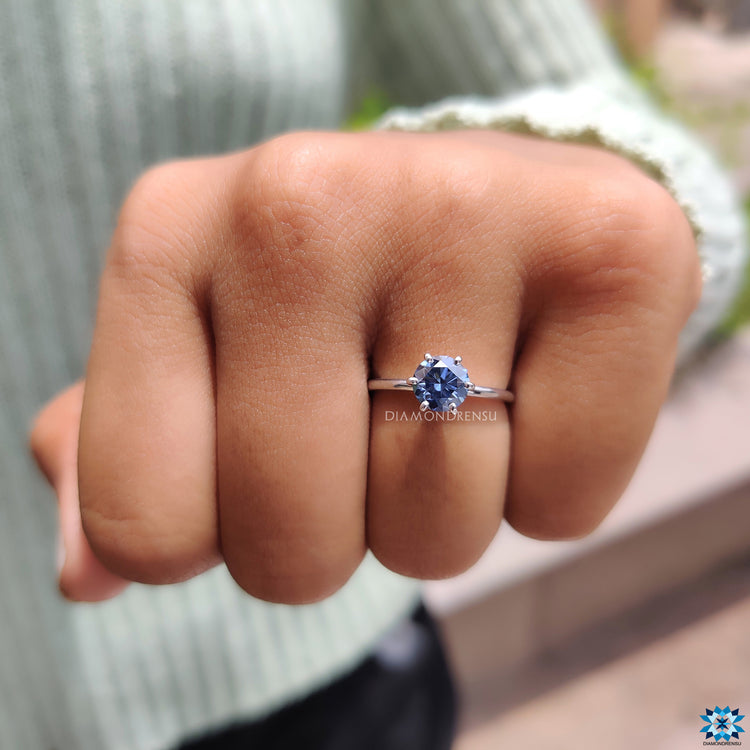 Royal dark blue moissanite solitaire ring.
