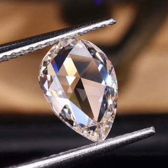 Pear cut diamond ready for custom jewelry design.
