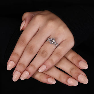 Collection of nature inspired oval diamond engagement rings, each featuring a unique step cut diamond.