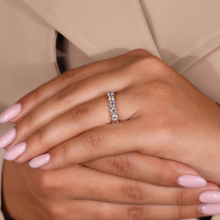 Handmade jewelry wedding band with fine details.
