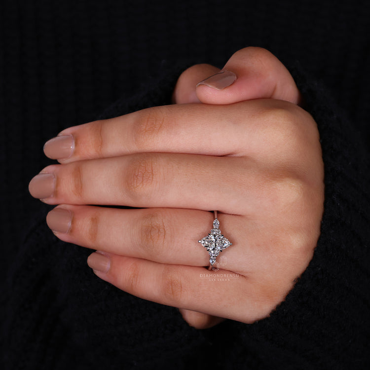 Muse Ring with elegant round cut diamond in a secure setting.