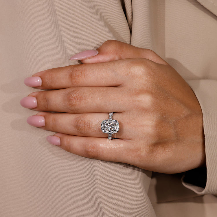 Halo diamond engagement ring with intricate handmade details.