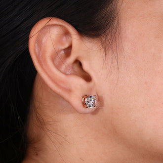 4 carat diamond earrings in a handmade design for timeless appeal.