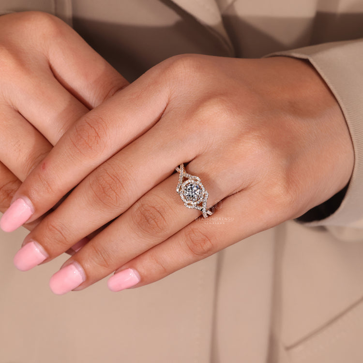 Handmade antique vintage diamond ring with round side stones.
