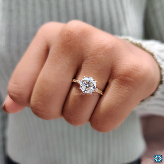 Yellow gold engagement ring offers a warm, classic look.
