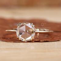 Round Rose Cut Engagement Ring with a secure setting.
