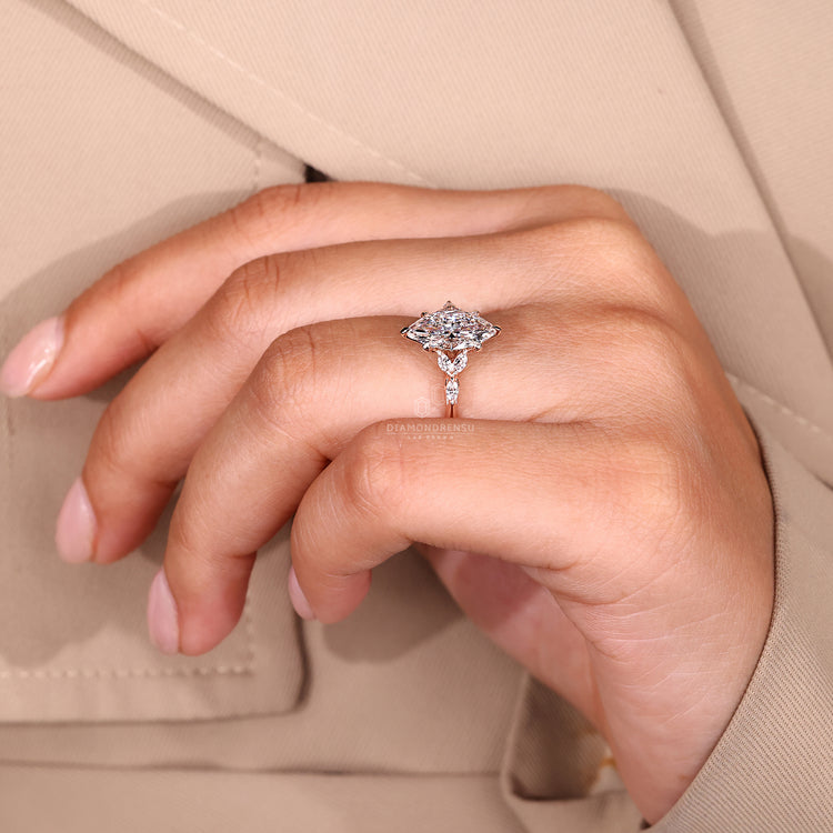 Handmade marquise shaped diamond ring with knife edge shank and IGI.
