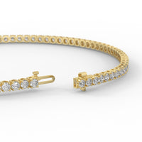 14k yellow gold diamond bracelet for women.