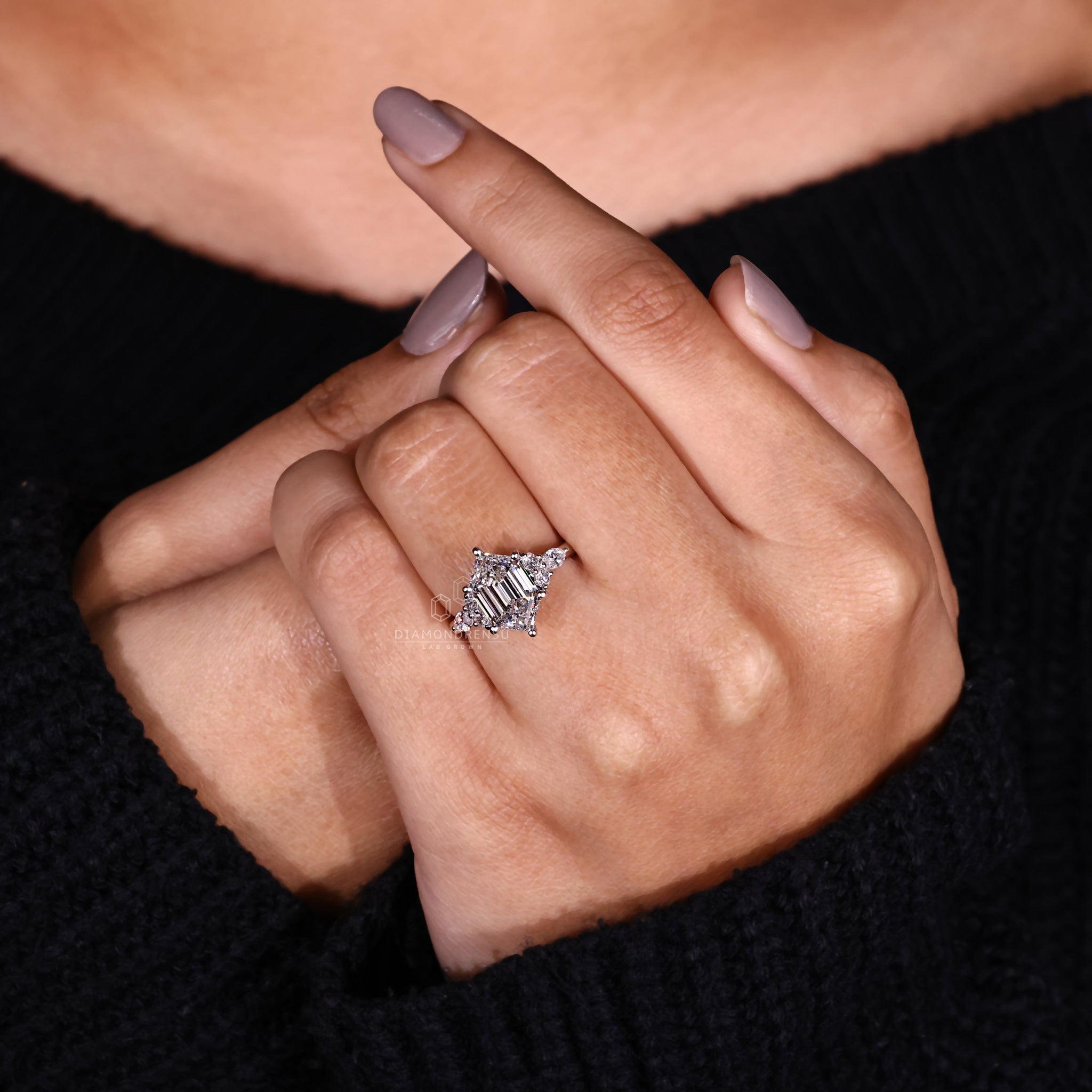 A hexagon diamond engagement ring displayed on a hand, illustrating its graceful proportions and eye-catching brilliance
