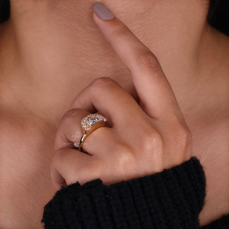 Bezel setting ring with semi halo setting.
