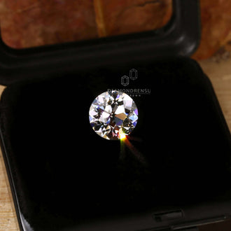 2.5 carat round Old European cut diamond adds charm to custom designs.