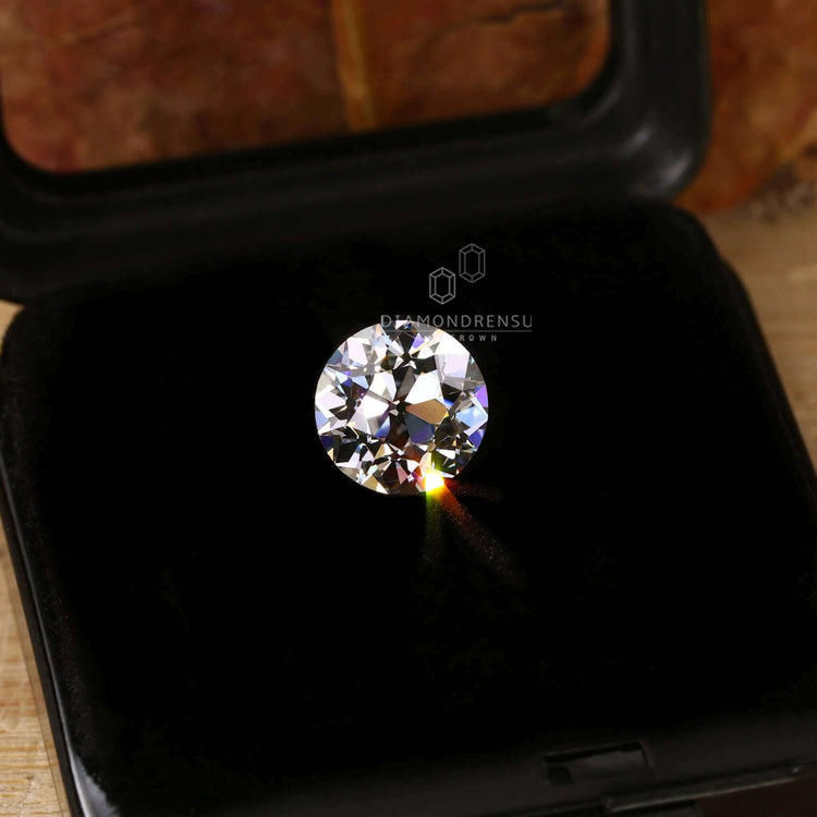 2.5 carat round Old European cut diamond adds charm to custom designs.