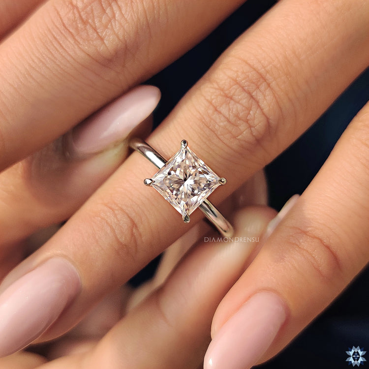 Handmade jewelry featuring a stunning hidden halo engagement ring.
