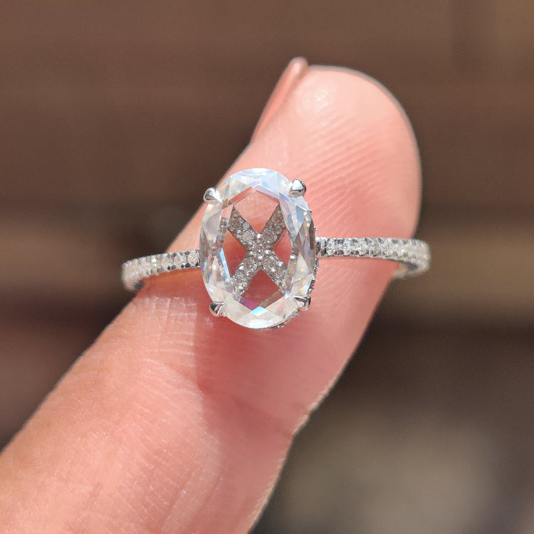This oval rose cut engagement ring offers a unique, elegant design.
