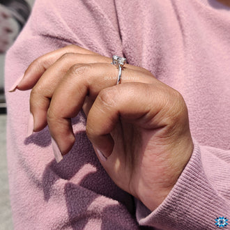 Handmade jewelry featuring custom moissanite engagement ring