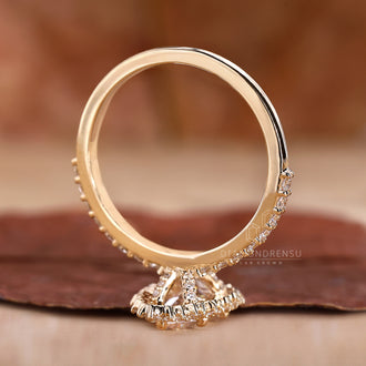 Yellow Gold Ring featuring a radiant pear diamond.