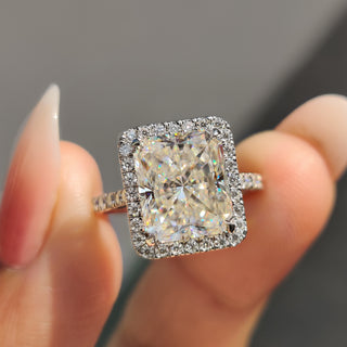 Radiant cut moissanite ring set in a beautiful white gold band.
