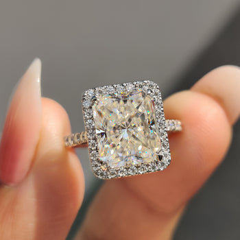 Radiant cut moissanite ring set in a beautiful white gold band.
