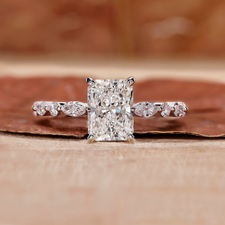Radiant Cut Diamond Ring featuring a stunning pave set diamond band.