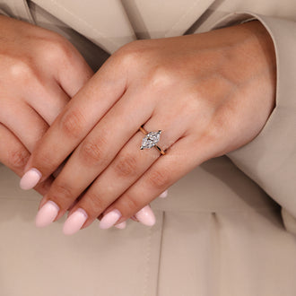 Cathedral Setting Ring with a stunning Dutch Marquise cut diamond and hidden halo details.
