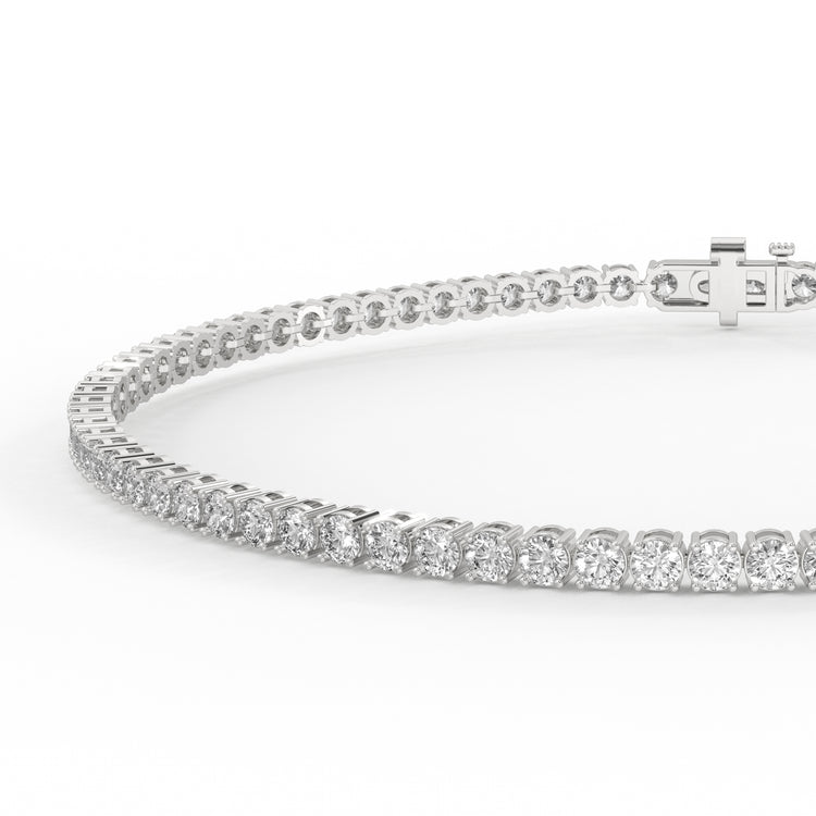 White gold tennis bracelet with round diamonds.
