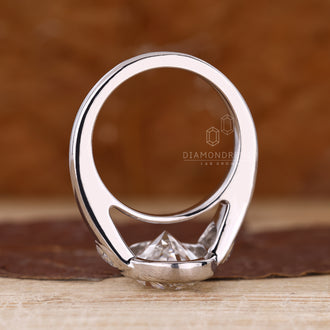 Handmade jewelry crafted as 3 stone diamond ring with oval cut center diamond.

