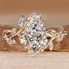 Pear cut engagement ring with nature inspired design.