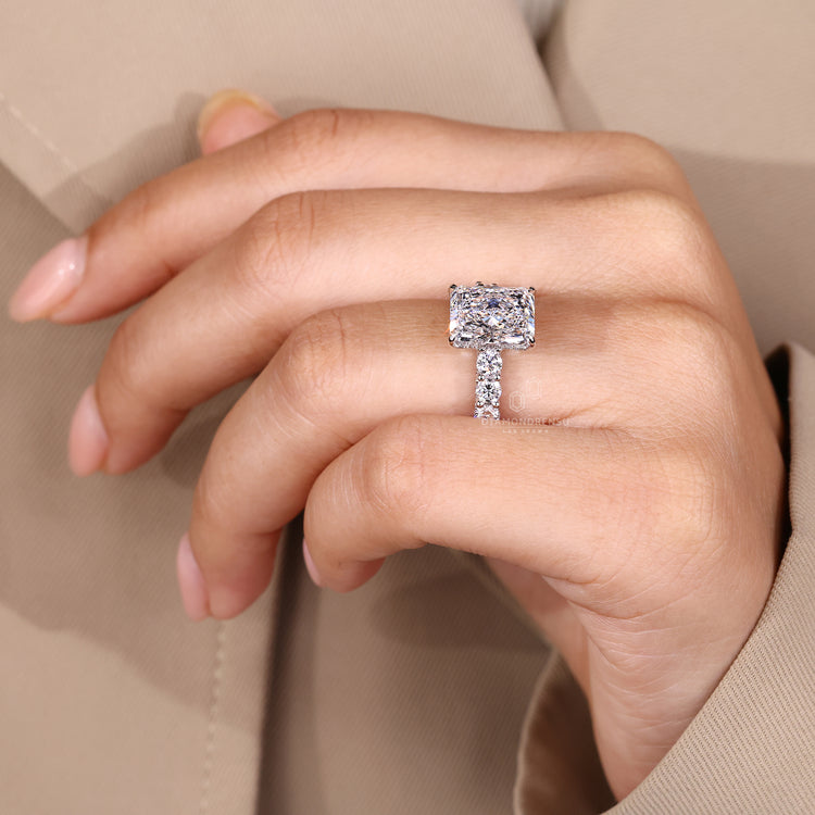 Handmade ring with radiant diamond and hidden halo design.
