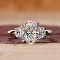 A white gold oval diamond ring with elegant shine
