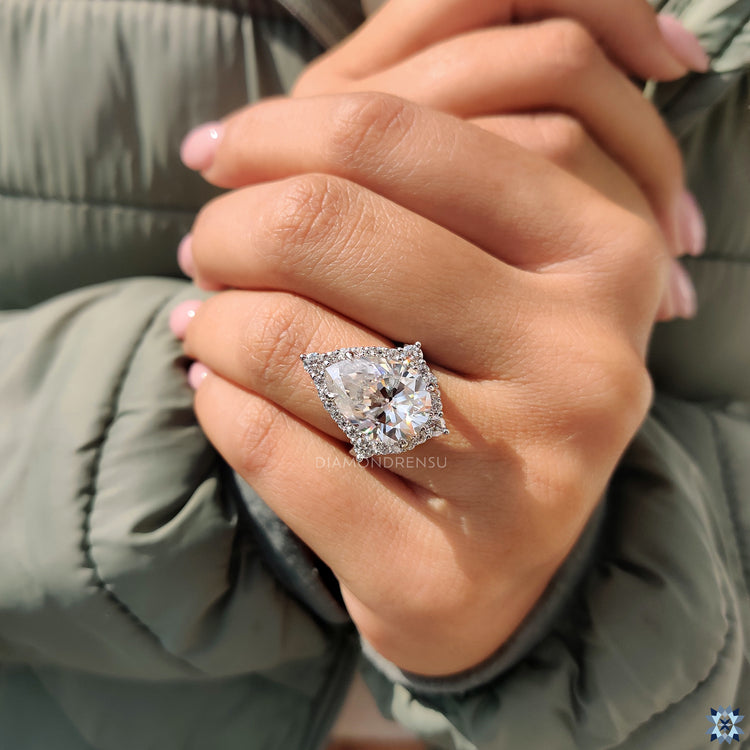 Hidden round ruby in bridge accent design, adding a pop of color and charm.
