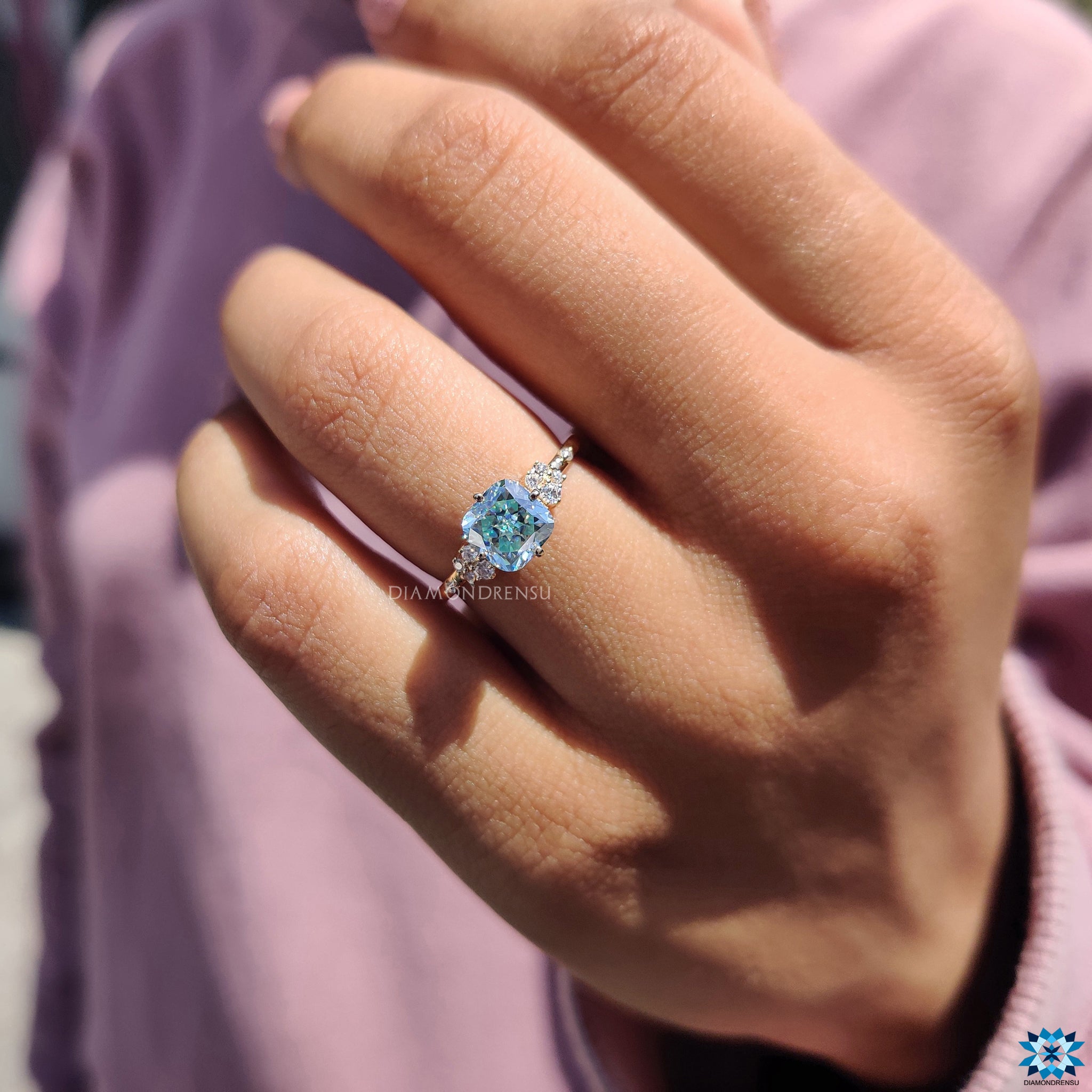 Detailed shot of cushion cut ring with compass prong setting